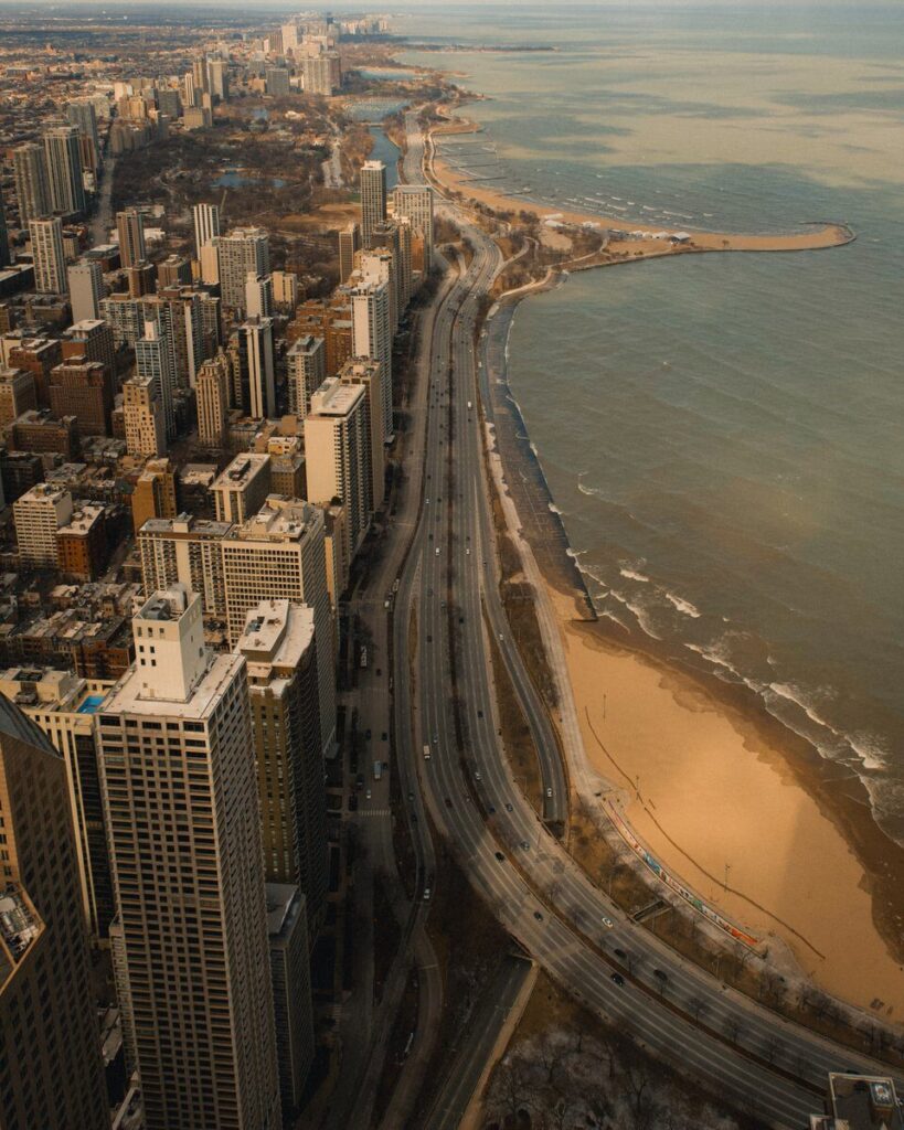 A breathtaking aerial view of Chicago skyline alongside Lake Michigan, showcasing urban architecture.