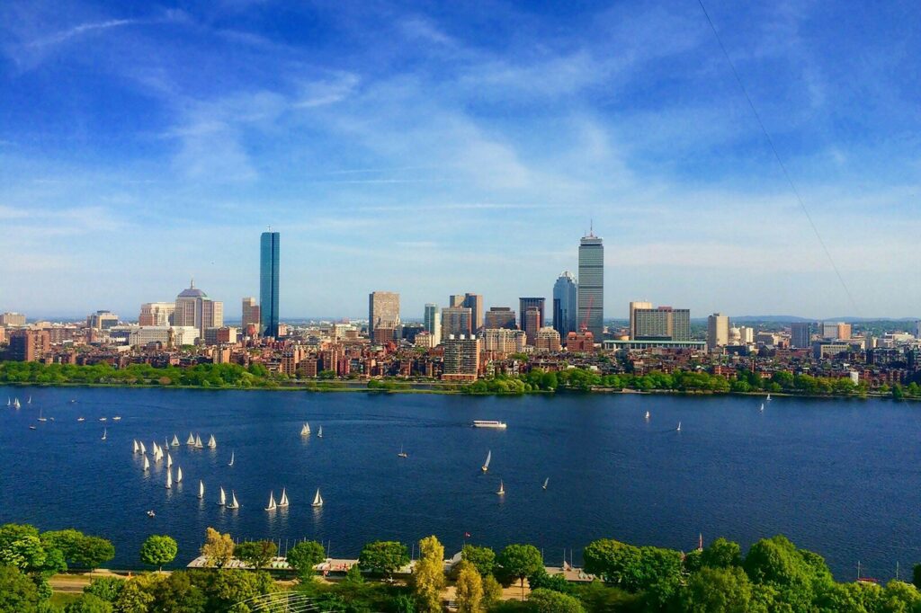 Photo by jacob Licht body of water near cityscape at daytime
