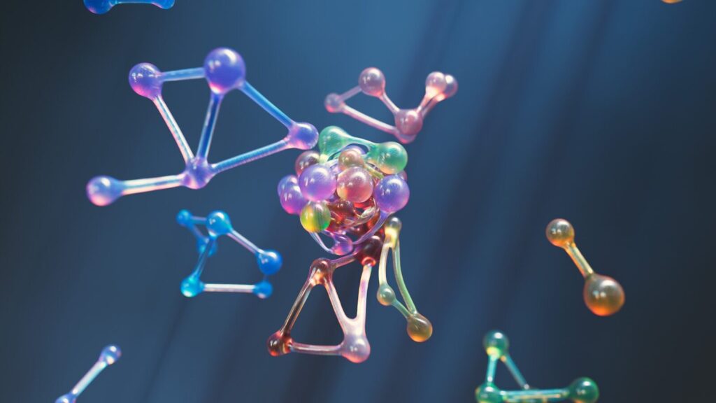 a group of different colored objects floating in the air